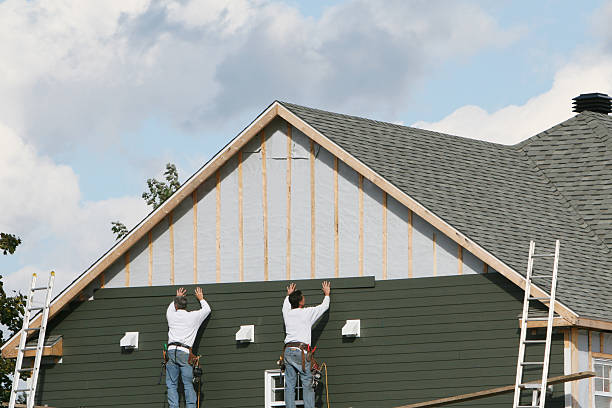 Professional Siding Contractor technician working in Kings Park, VA